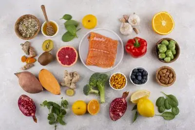 top view immunity boosting foods with vegetables fish